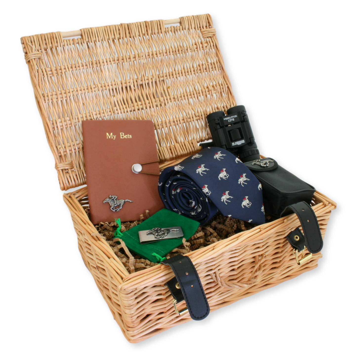 A wicker gift basket containing a notebook with a horse racing motif, binoculars, a navy blue tie with a racing horse and jockey design, and a stainless steel money clip.